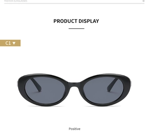 Front view of vintage oval sunglasses in glossy black resin with C1 model code