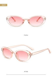 Detail view of pink oval sunglasses showing front and side angles with model code C6