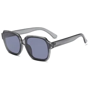 Modern oversized square sunglasses with transparent grey frames and purple gradient lenses