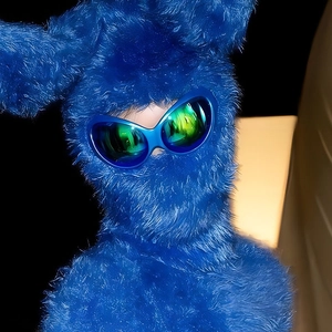 Y2K cyber alien futuristic sunglasses with fluffy electric blue hood and green lens