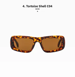 Detail view of tortoiseshell frame sunglasses with deep brown lenses in a rectangular style