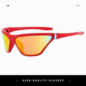 Detail of red oversized Y2K sports sunglasses with orange gradient mirror lenses