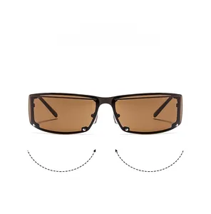 Detail of Y2K rectangle sunglasses featuring metallic studs and a glossy black frame