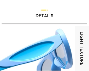 Close-up of light blue Y2K oval sunglasses with a wide frame and glossy texture finish