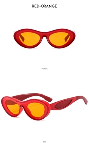 Detail view of red-orange Y2K sunglasses showing the side and positive frame angles