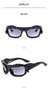 Y2K irregular wavy black sunglasses with purple gradient lenses shown in dual views