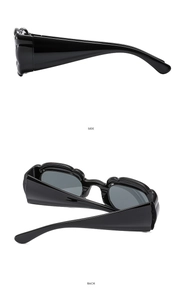 Detail view of bold black puffy frame sunglasses from side and back perspectives