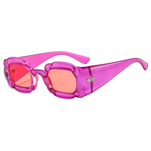 Modern flower petal shaped sunglasses in transparent pink purple with gradient lenses
