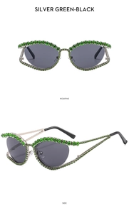 Front and side view of silver cat-eye sunglasses with luxury green rhinestones