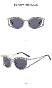 Detailed views of luxury cat eye sunglasses with silver metal frames and sparkling rhinestones