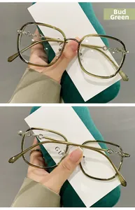 Detail of bud green TR90 glasses frame with elegant chain design metal temples