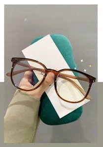 Detail view of transparent brown TR90 glasses frame with anti-blue light filter lenses