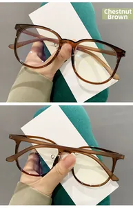 Detail of TR90 chestnut brown eyeglasses frame with anti-blue light coating reflection