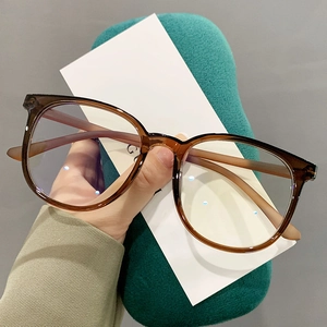 Retro round brown transparent TR90 eyeglasses frame with blue light blocking lenses