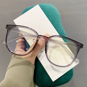 Neutral large frame TR90 anti-blue light glasses in transparent smoky grey finish