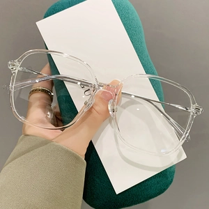 Oversized clear TR90 glasses frame with slim silver metal temples for a modern look