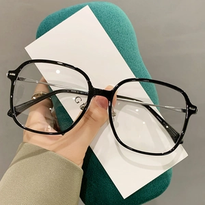 Classic TR90 black square frame glasses with silver metal temples on green velvet case
