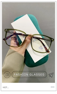 Detail of TR90 square glasses frames with green tortoiseshell and metal hinges