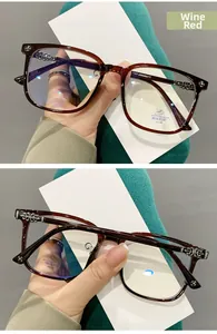 Detailed close-up of wine red TR90 glasses frames with chrome floral metal temple accents