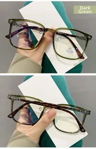 Close-up of retro cross hardware on dark green TR90 anti-blue light glasses frames