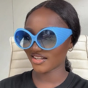 Lunettes de soleil rondes Y2K bleues surdimensionnées avec protections latérales