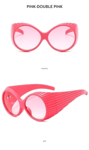 Lunettes de soleil rondes Y2K roses avec texture radiale sur les branches