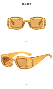 Lunettes de soleil fleur ambre modernes avec montures ondulées en vues de face et de profil