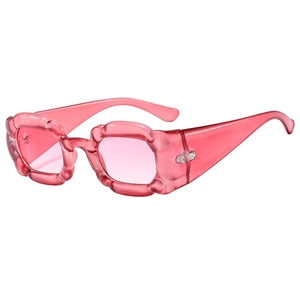Lunettes de soleil roses pour femmes avec monture ondulée en forme de fleur chic