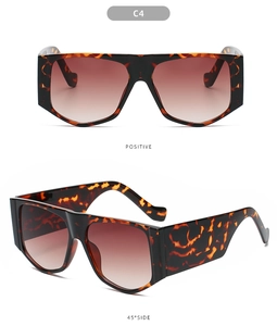 Detail of oversized flat top tortoise sunglasses with gradient brown lenses in two angles