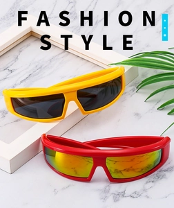 Y2K futuristic sports sunglasses in vibrant red and yellow with streamlined visor frames