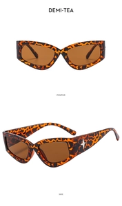 Dettaglio occhiali cat-eye demi-tea con decorazioni metalliche a stella e vista laterale