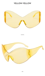 Futuristic Y2K oversized yellow wrap-around sunglasses shown from front and side view
