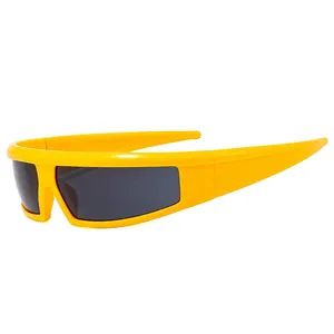 Bright yellow sporty Y2K sunglasses with wraparound dark lenses in a cyberpunk style