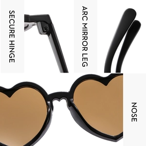 Détails de lunettes cœur montrant charnières, branches courbées et pont de nez
