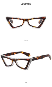 Detail view of cat eye glasses frames with leopard print texture and clear glitter finish