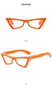 Detail view of orange cat eye glasses frame with geometric edges and glitter finish