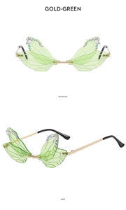 Detail of rimless dragonfly wing sunglasses with gold frames and sparkling rhinestones