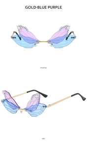 Detail of dragonfly wing sunglasses with gold frames, gradient lenses and crystal accents