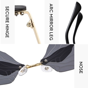 Detail of secure gold hinges, arc mirror legs, and nose pads on dragonfly sunglasses