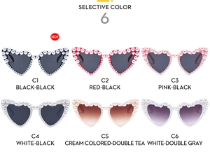 Detailed grid of heart-shaped sunglasses with pearl accents in six stylish color options
