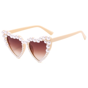 Fashionable heart-shaped sunglasses with faux pearl trim and gradient brown lenses