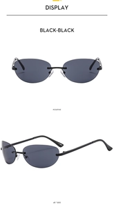 Retro rimless sunglasses with dark grey oval lenses and thin black metal temples