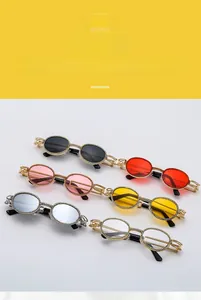 Detail of oval diamond-studded punk sunglasses in six color options with hollow metal arms
