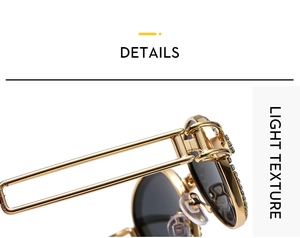 Macro view of oval metal sunglasses featuring diamond-encrusted frames and light texture