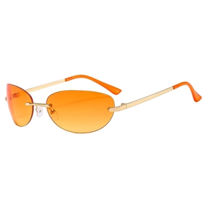 Retro rimless Y2K sunglasses with orange lenses and golden metal frames for women