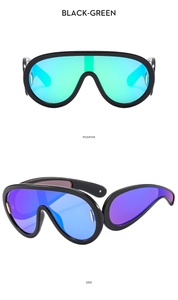 Front and side views of black wide-frame sports sunglasses with green gradient lenses