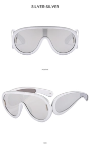 Front and side views of silver mirrored oversized futuristic punk sports sunglasses