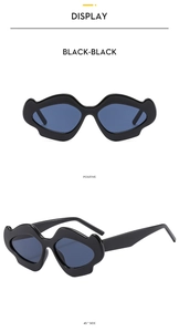 Irregular wavy black frame sunglasses with blue lenses shown in front and side views