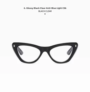 Detail of shiny black cat-eye frames with silver diamond rivets and anti-blue light lenses