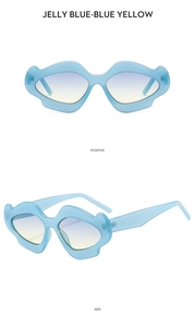 Jelly blue wavy frame sunglasses with blue-yellow gradient lenses from multiple angles